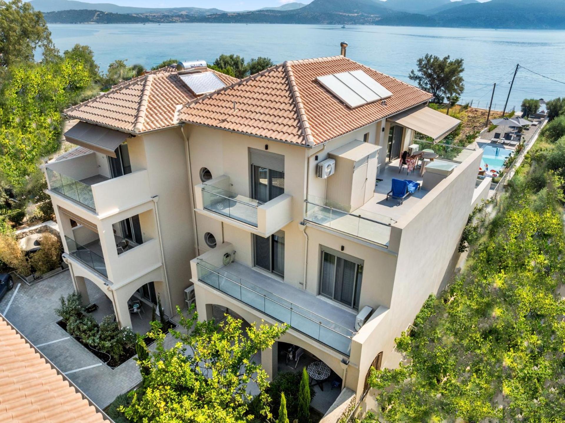 Blue Symphony Suites Apartments Никиана Экстерьер фото